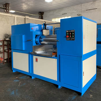 Two roll mill for rubber compounding
