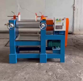 Close-up of laboratory mixing mill processing PVC material