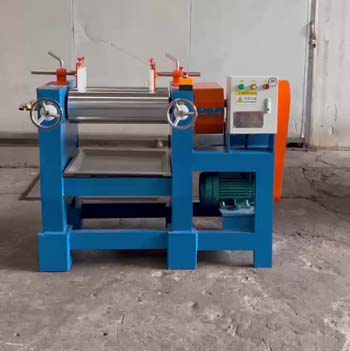 Close-up of laboratory mixing mill processing PVC material