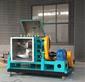 Stainless Steel Sigma Mixer with Automated Material Loading System showing hopper, screw conveyor, and mixing chamber – industrial mixer by Simptek Machine