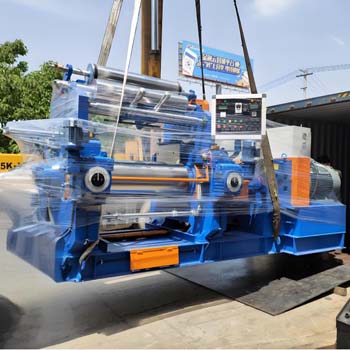Two roll mill with stock blender for rubber mixing efficiency